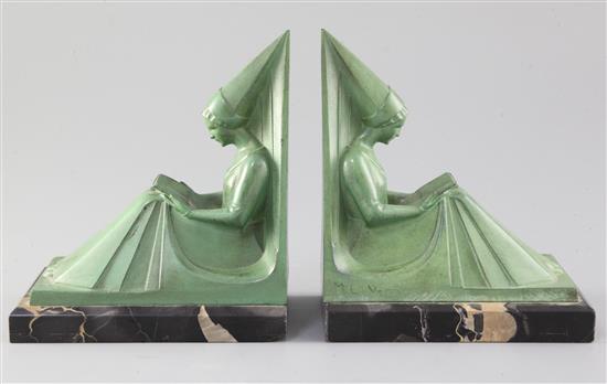 Max Le Verrier. A pair of green patinated spelter bookends, width 6in. height 6.75in.